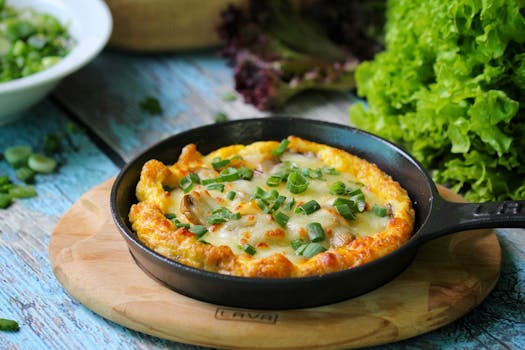 Appetizing vegetable frittata in a skillet on a rustic table with fresh greens. Perfect for brunch ideas.